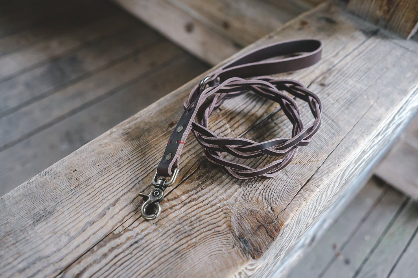 handmade in Canada braided leather dog leash in brown with antique brass hardware