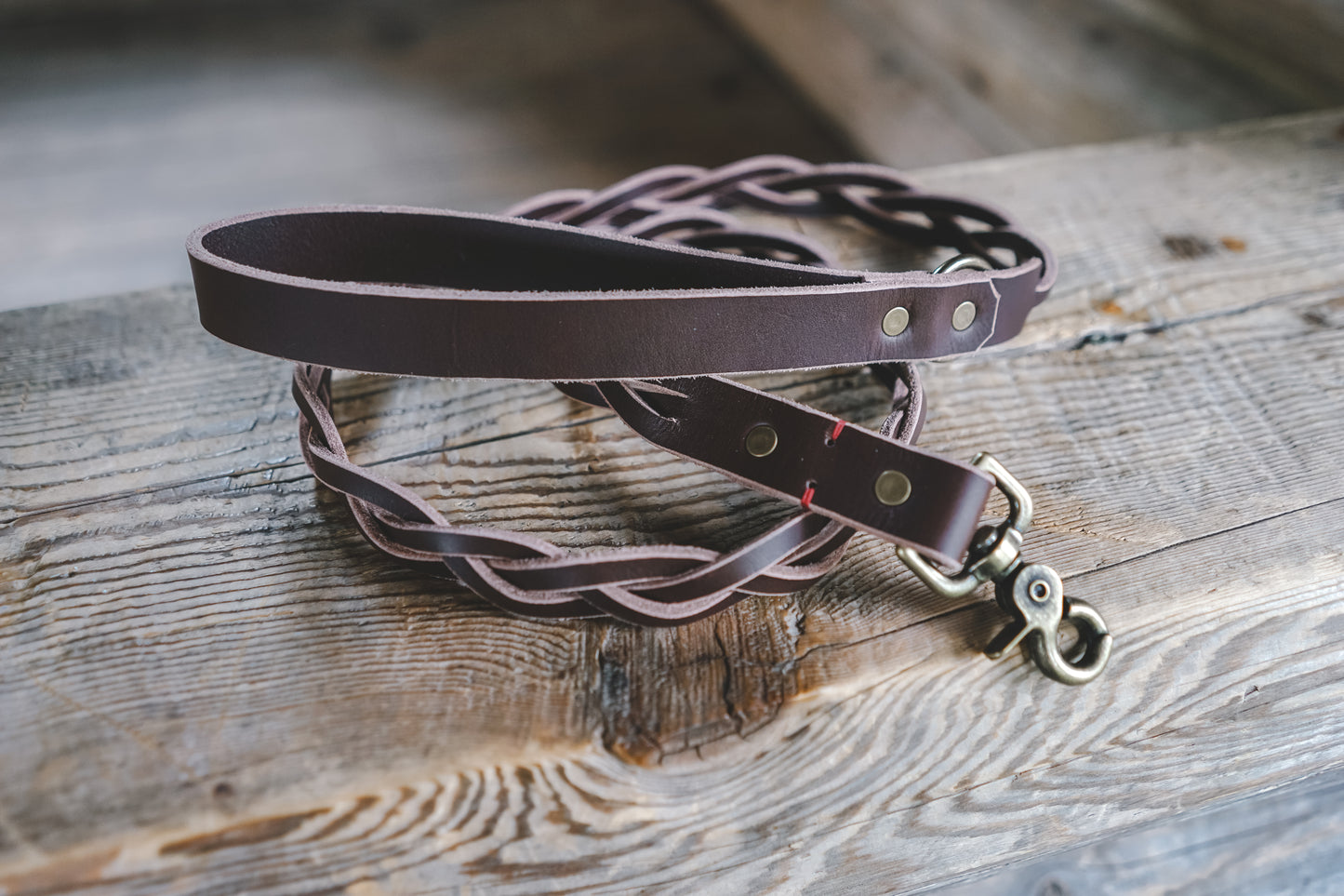 handmade in Canada braided leather dog leash in brown with antique brass hardware